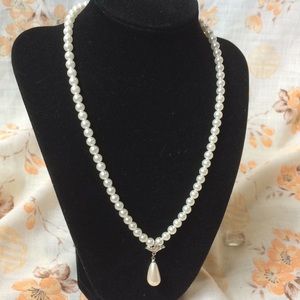 Pearl necklace with charm